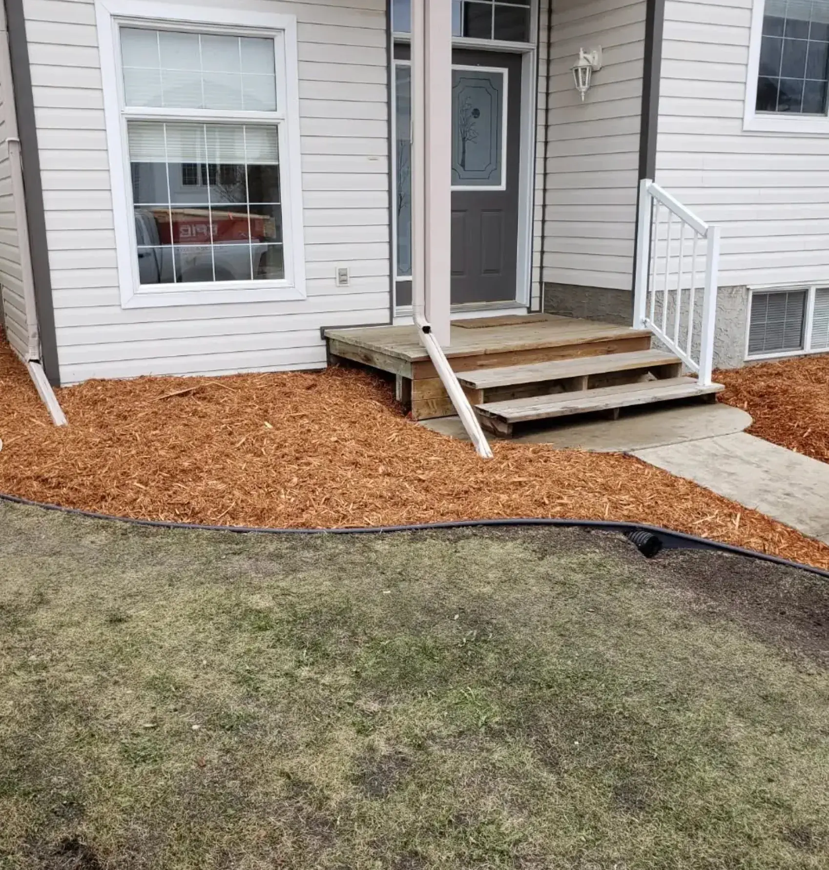 Mulch Bed Restoration - After renovation by Epic Landscape Services in Red Deer