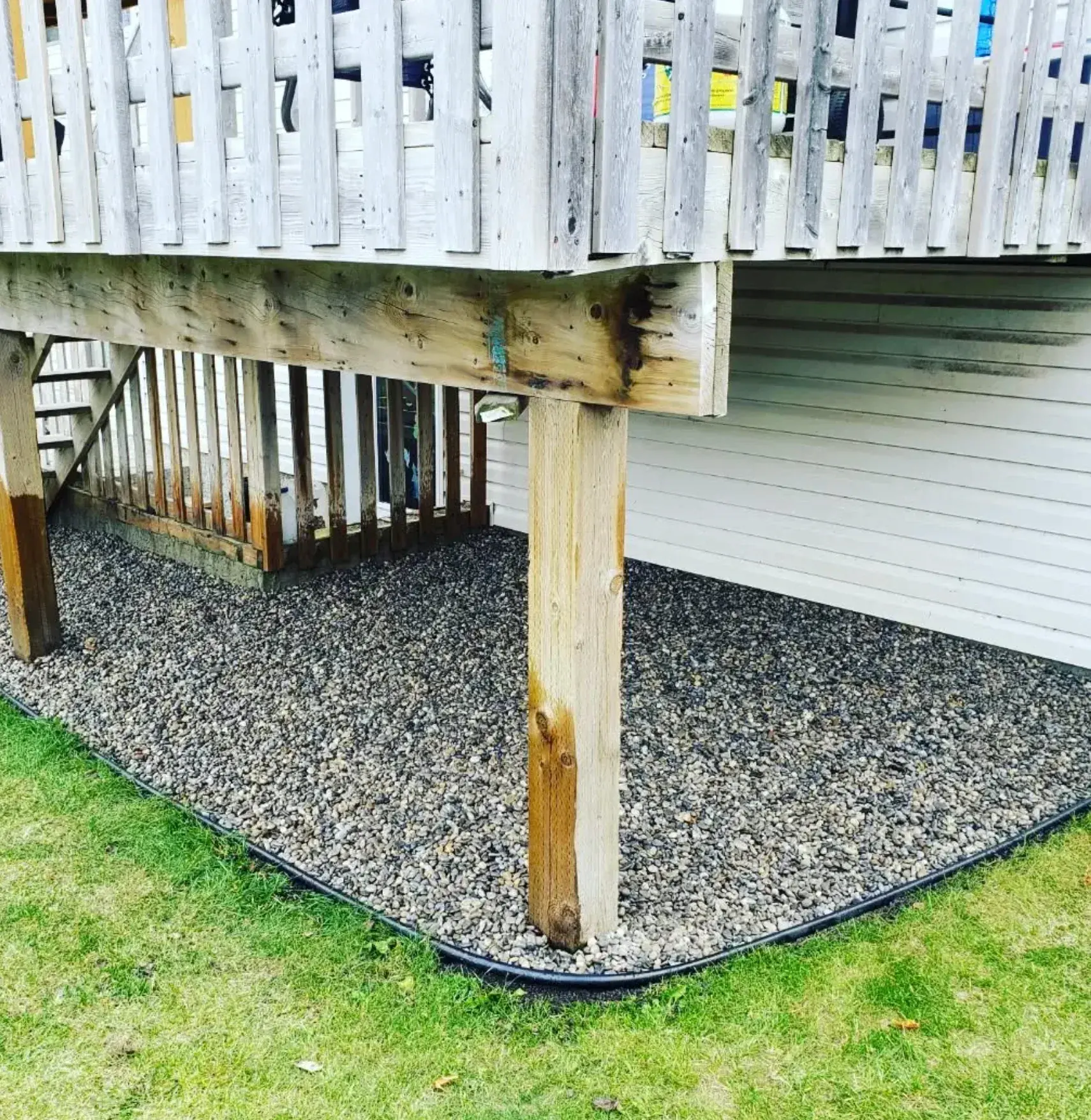 Under-Deck Ground Cover - After renovation by Epic Landscape Services in Red Deer