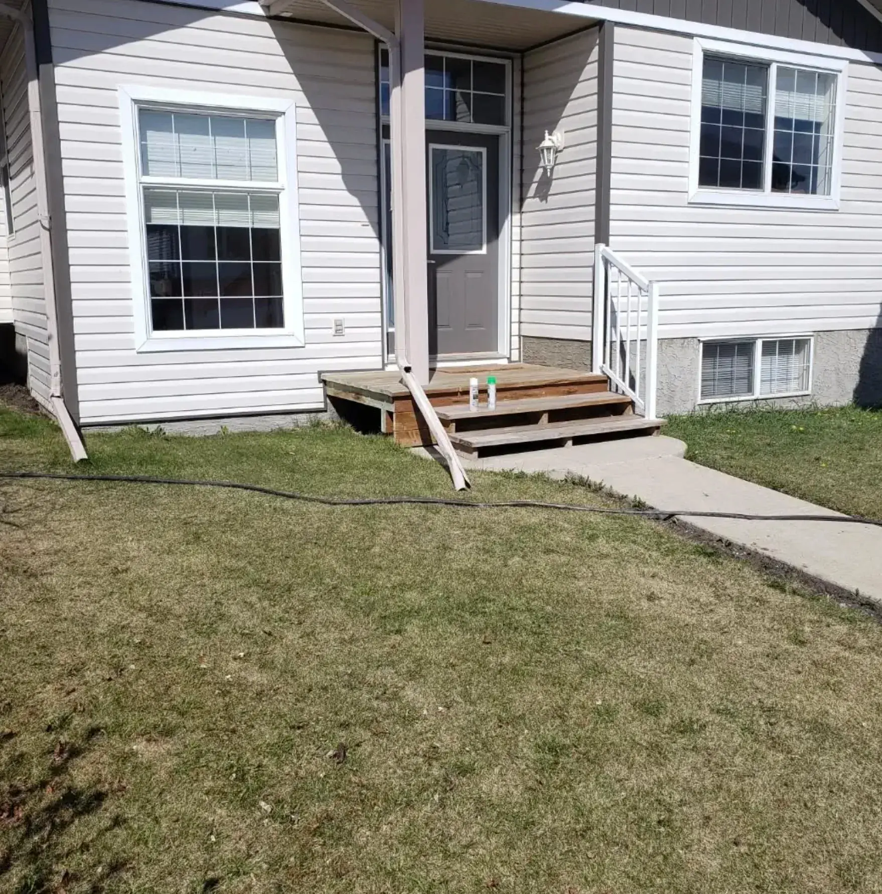 Mulch Bed Restoration - Before renovation by Epic Landscape Services in Red Deer